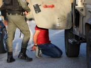 الاحتلال يعتقل طفلا من مخيم عين السلطان